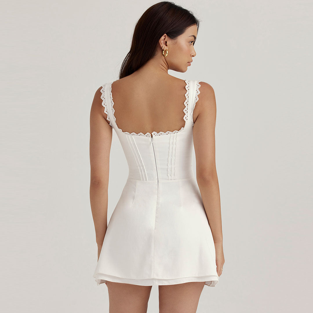 Ilene - Feminine embroidered sleeveless mini dress with pleated trim and V-neck